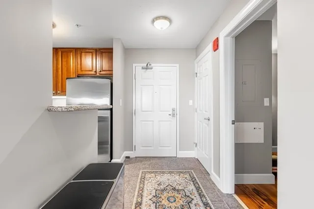 a view of an empty room and window