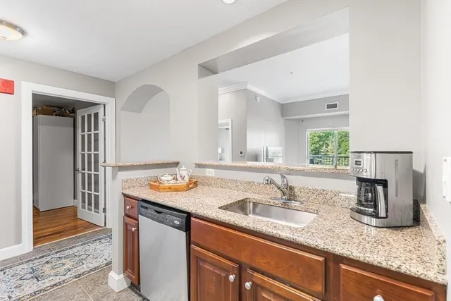 a bathroom with sink and mirror