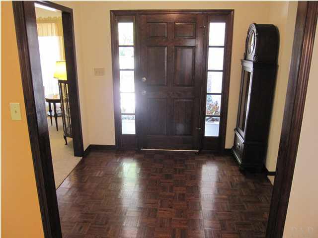 4265 April Road Pensacola, FL 32504 - Photo 4 of 25 View of the foyer from the dining room with real Parquet flooring.