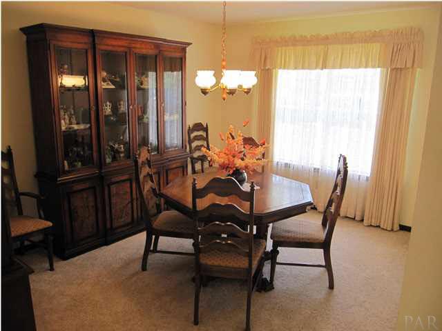 4265 April Road Pensacola, FL 32504 - Photo 7 of 25 This view of the dining room is from the foyer. The kitchen & family room are to your right.