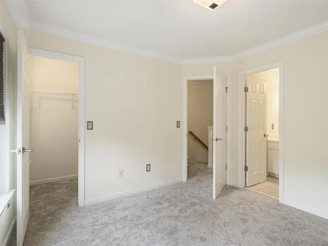 a view of storage and utility room with washer and dryer