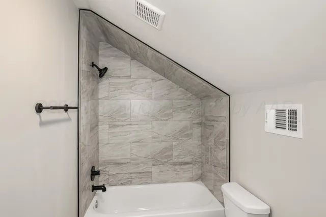 a bathroom with a bathtub