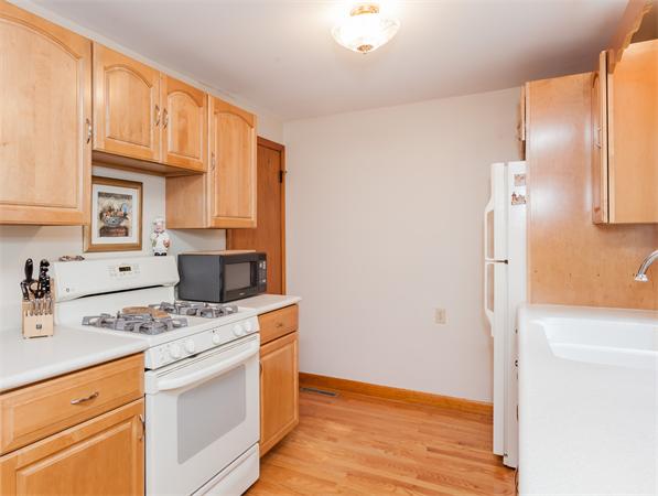 36 Blossom Road West Springfield, MA 01089 - Photo 13 of 30 a kitchen with stainless steel appliances granite countertop a sink stove and refrigerator
