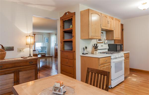 36 Blossom Road West Springfield, MA 01089 - Photo 16 of 30 a kitchen with stainless steel appliances granite countertop a stove a sink a refrigerator and wooden cabinets