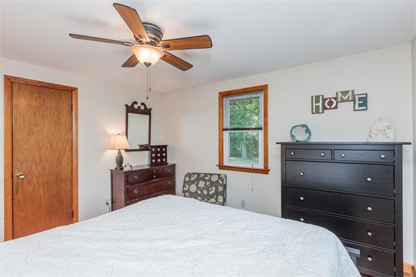 36 Blossom Road West Springfield, MA 01089 - Photo 22 of 30 a bedroom with a bed and a dresser