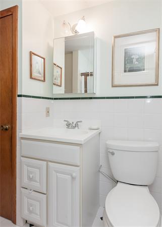 36 Blossom Road West Springfield, MA 01089 - Photo 30 of 30 a bathroom with a toilet sink and mirror