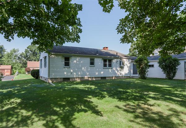 36 Blossom Road West Springfield, MA 01089 - Photo 5 of 30 a front view of a house with a garden
