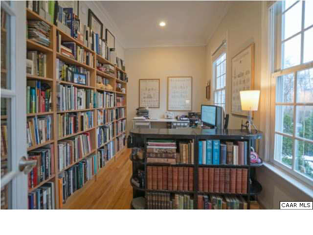 1876 Westview Road Charlottesville, VA 22903 - Photo 4 of 31 a living room with furniture a bookshelf and a window