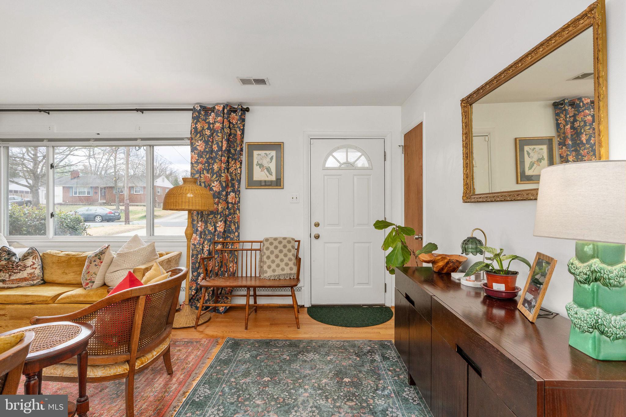 6714 Ruskin Street Springfield, VA 22150 - Photo 10 of 63 a living room with furniture and a large window