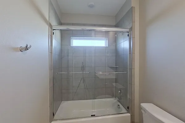 a bathroom with a bath tub