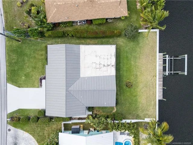 front view of a house with large windows