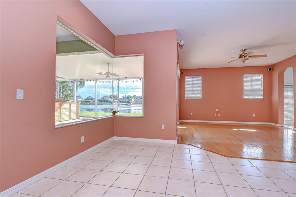 22704 Cliffside Way Land O' Lakes, FL 34639 - Photo 13 of 33 a view of an empty room with a window