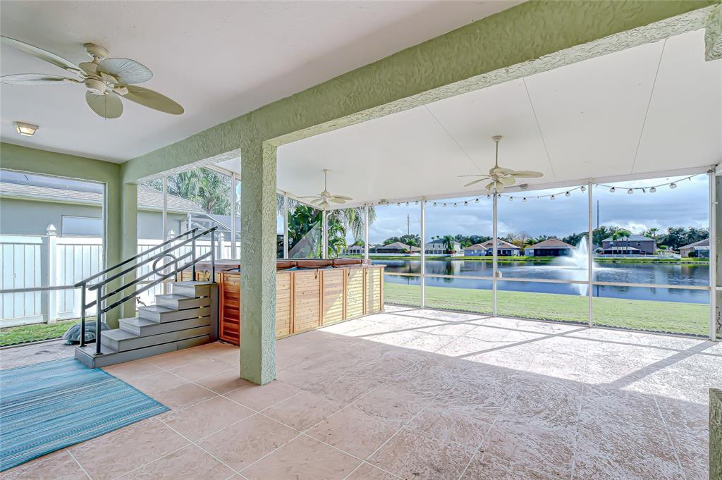 22704 Cliffside Way Land O' Lakes, FL 34639 - Photo 26 of 33 a view of water heater room with wooden floor