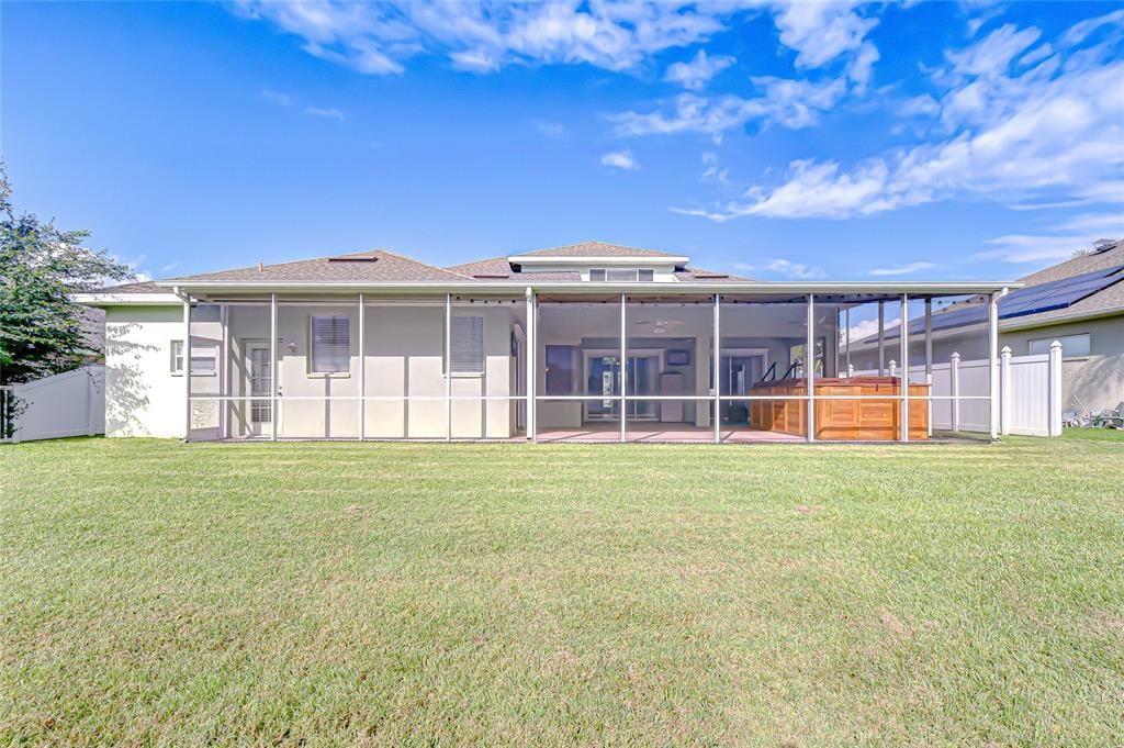 22704 Cliffside Way Land O' Lakes, FL 34639 - Photo 31 of 33 a front view of a house with a garden