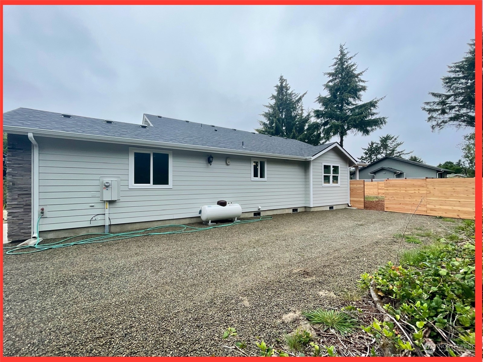154 Seagate Street Southwest Ocean Shores, WA 98569 - Photo 8 of 36 a view of a house with backyard