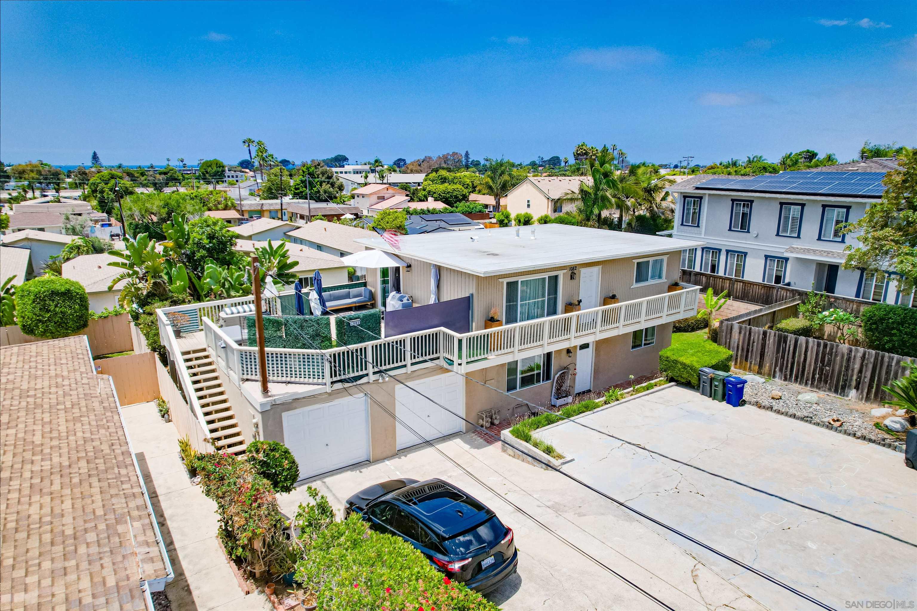 1076 Gardena Road Encinitas, CA 92024 - Photo 3 of 9 a view of a swimming pool with an outdoor seating