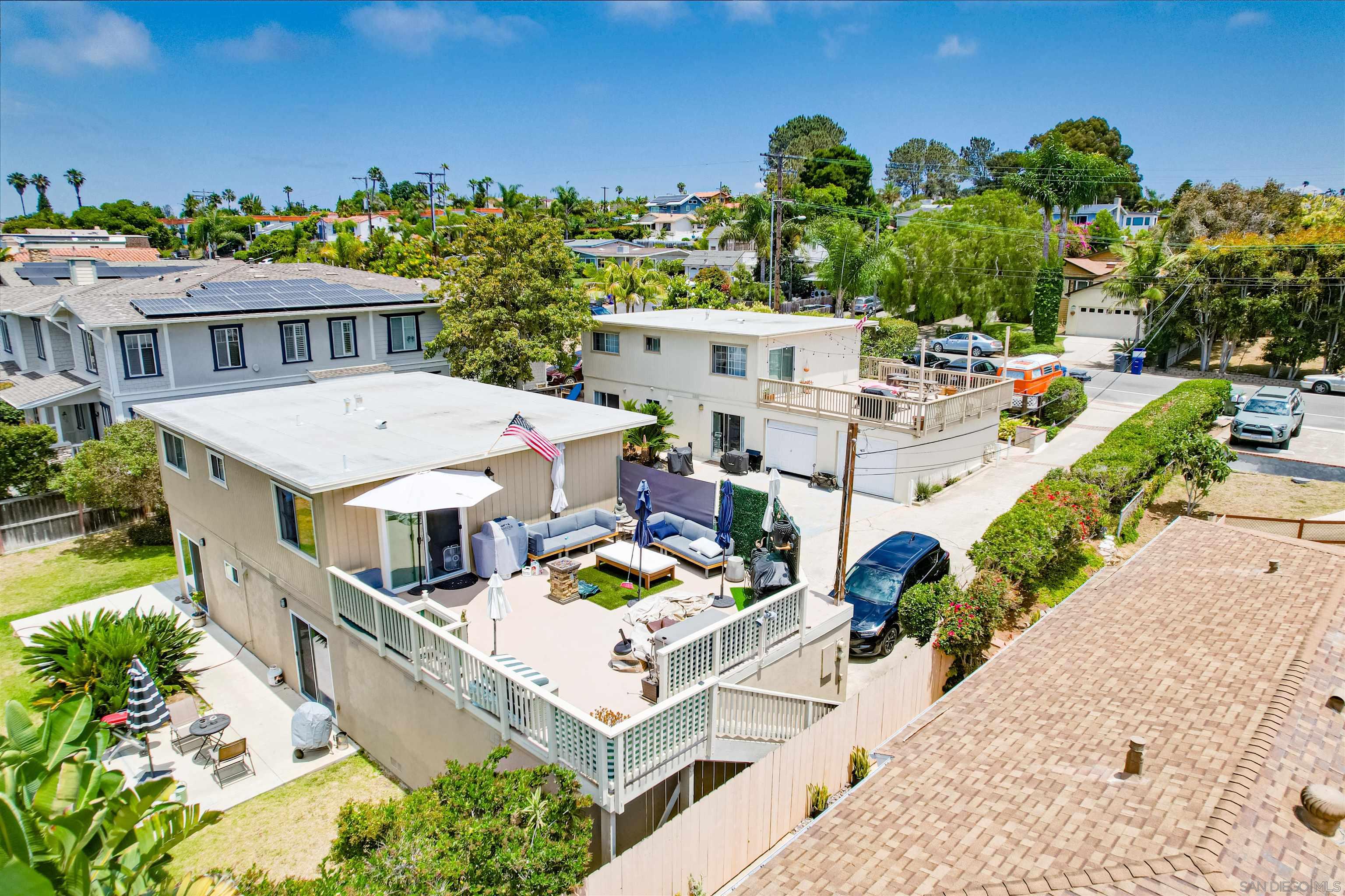 1076 Gardena Road Encinitas, CA 92024 - Photo 6 of 9 a view of a house with pool and chairs