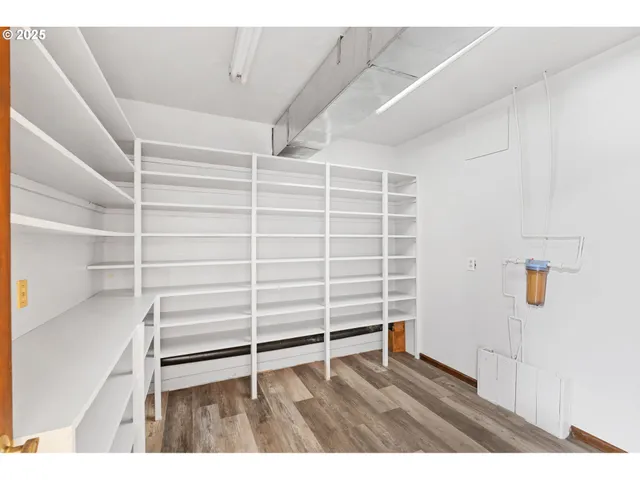 a view of a livingroom with furniture and window