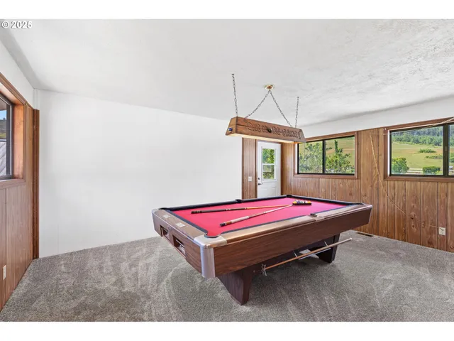 a view of a backyard with trees