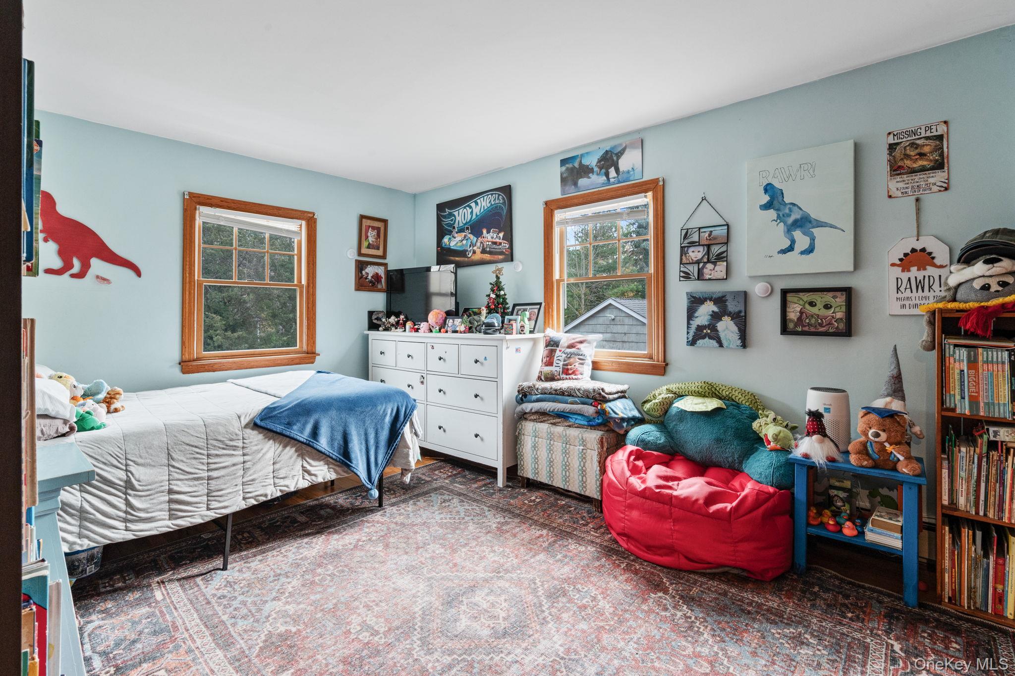 170 North Country Road Miller Place, NY 11764 - Photo 28 of 48 a bedroom with bed and a window