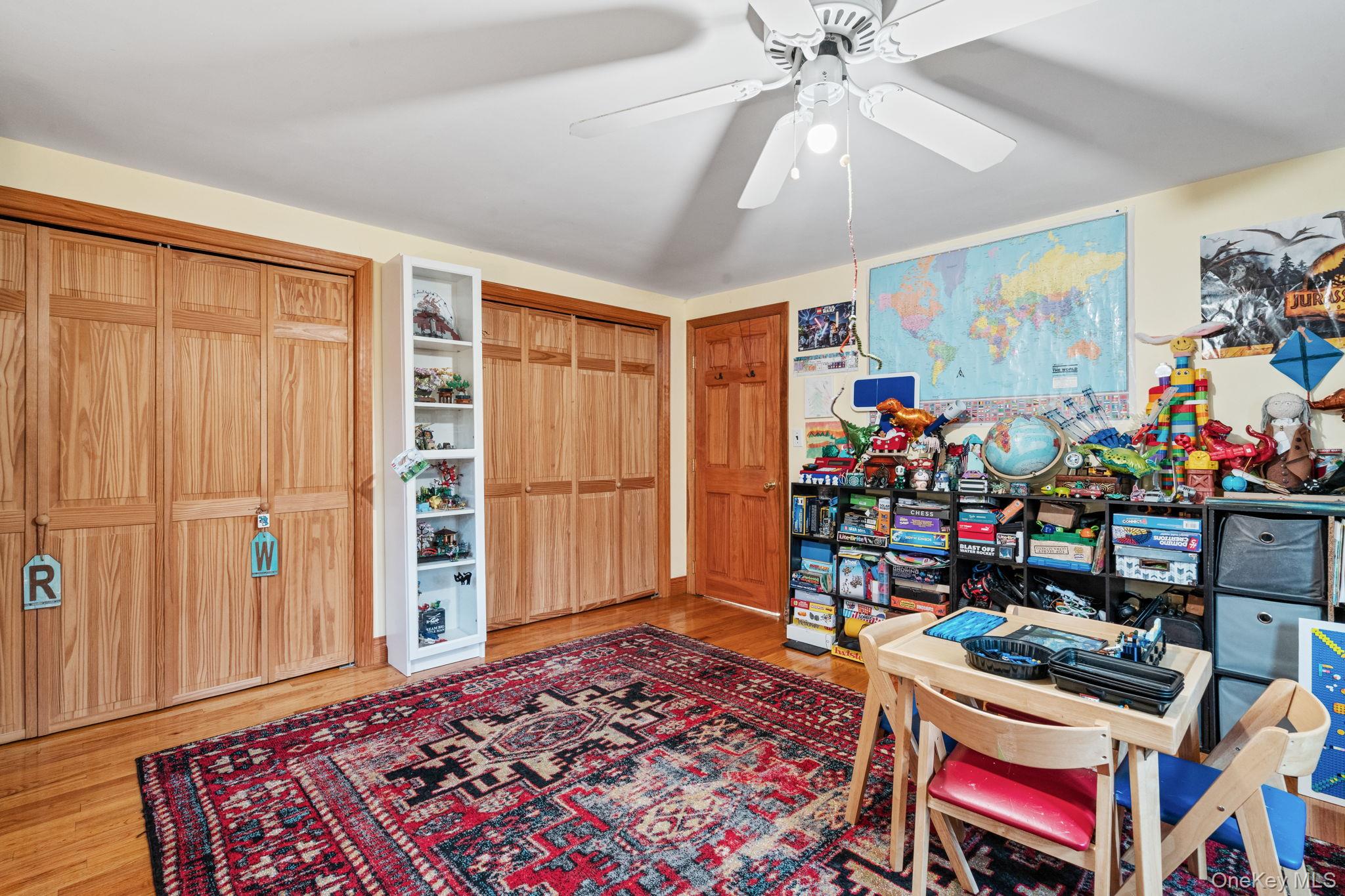 170 North Country Road Miller Place, NY 11764 - Photo 30 of 48 a room with furniture and a window