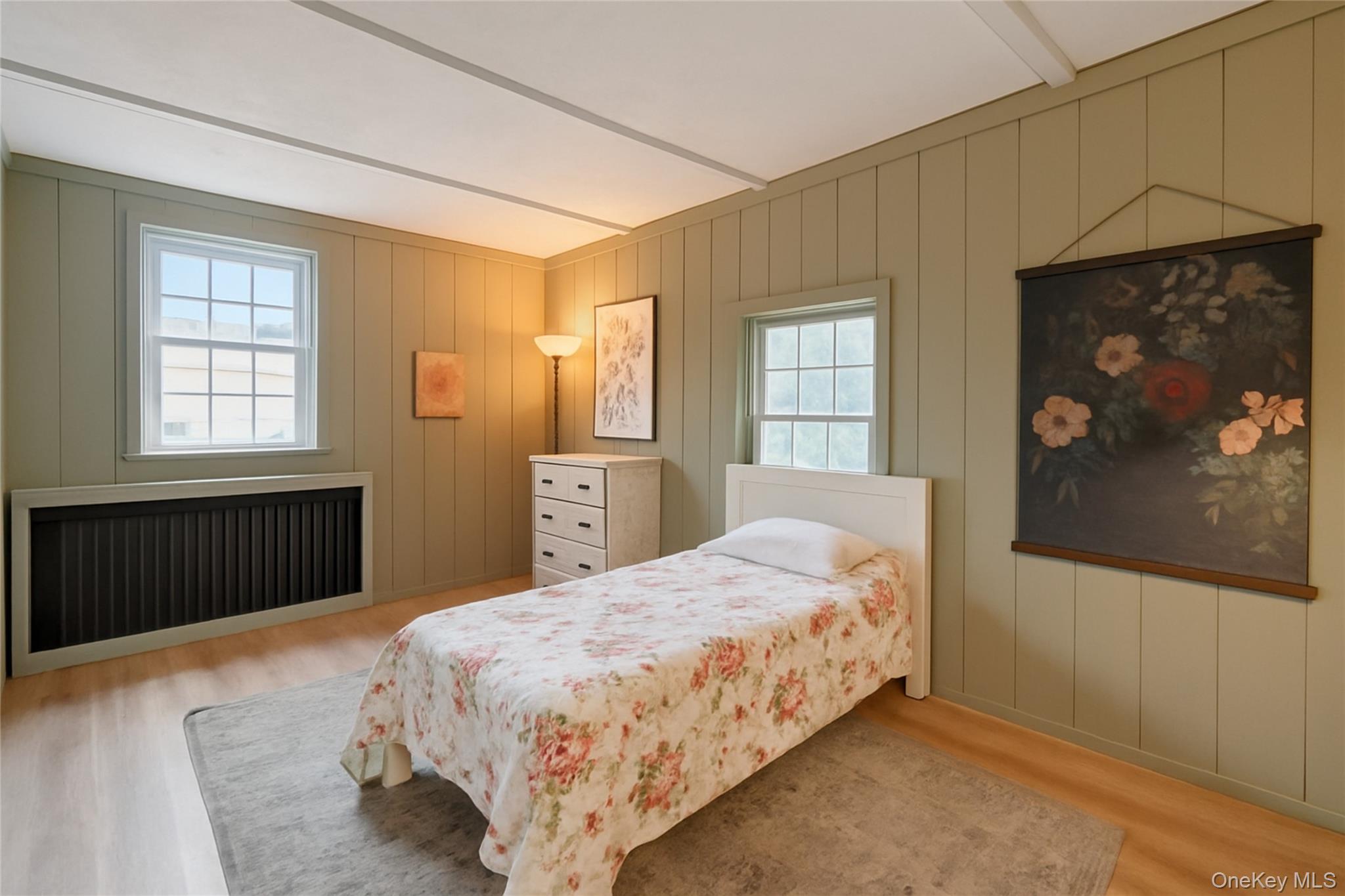 170 North Country Road Miller Place, NY 11764 - Photo 34 of 48 a bedroom with a bed dresser and a window