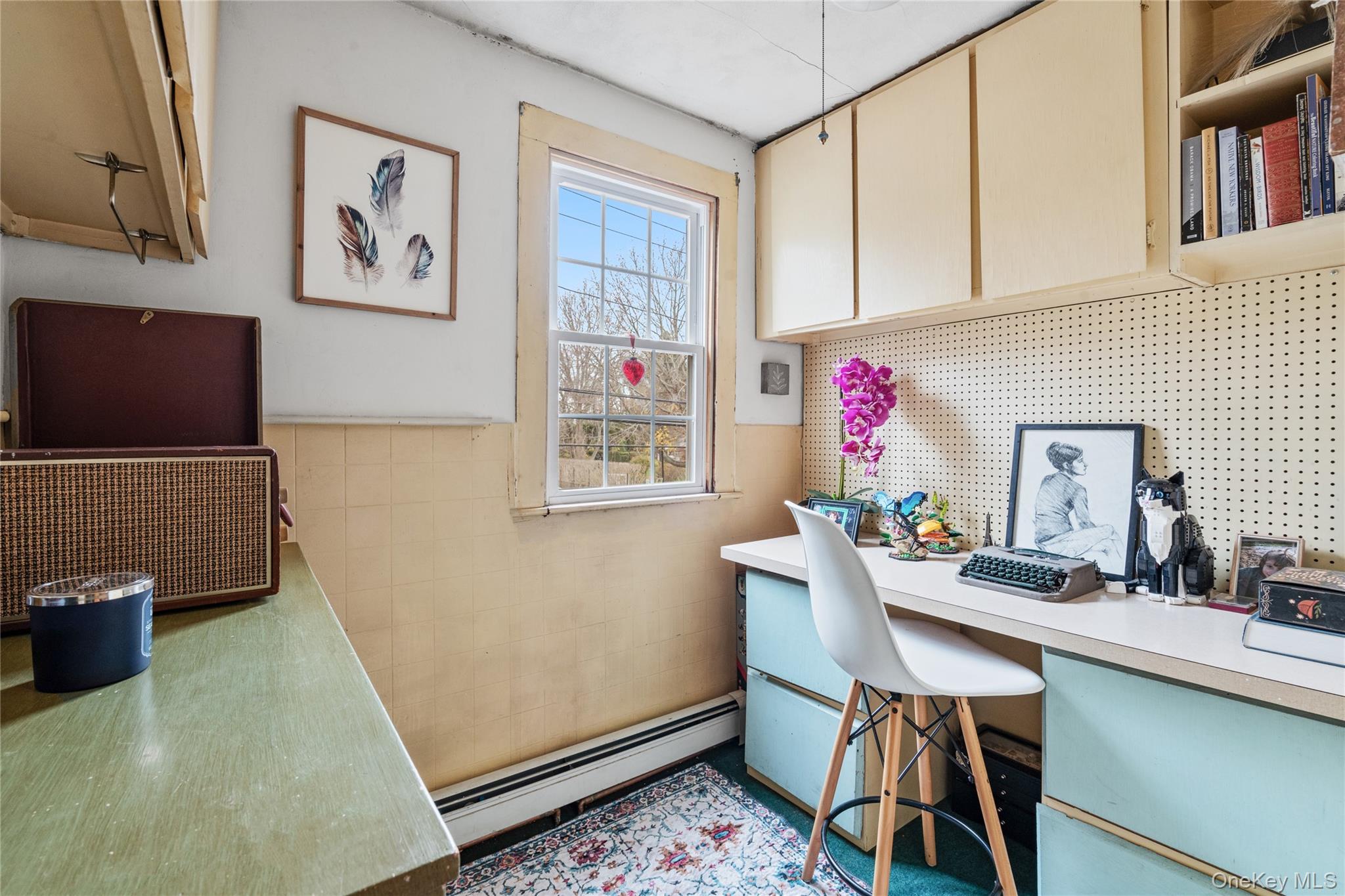 170 North Country Road Miller Place, NY 11764 - Photo 36 of 48 a view of a workspace with furniture and a window