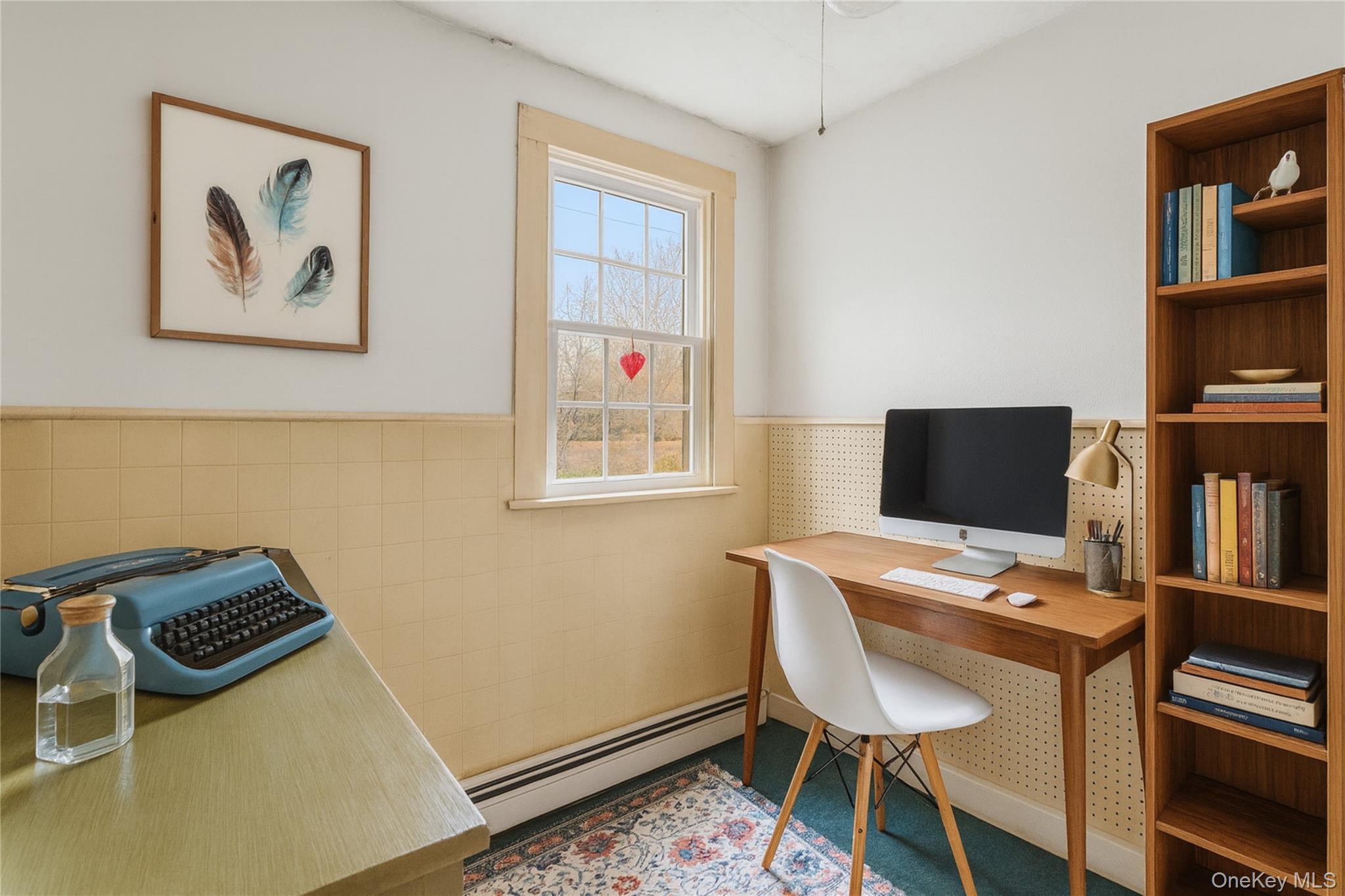 170 North Country Road Miller Place, NY 11764 - Photo 37 of 48 a view of a workspace with furniture and a window