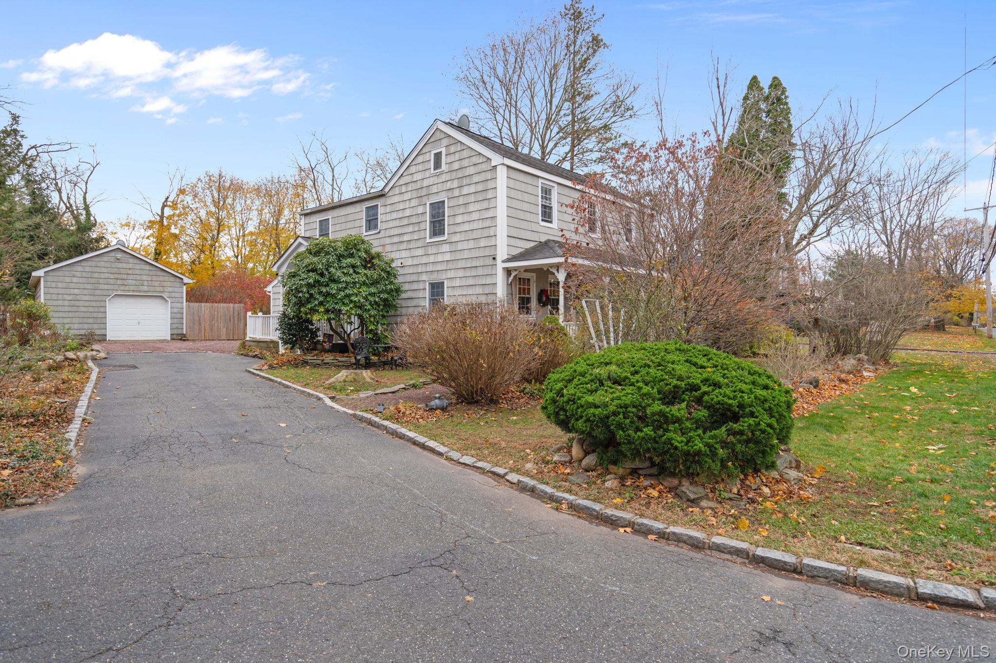 170 North Country Road Miller Place, NY 11764 - Photo 4 of 48 a view of a house with a yard and plant