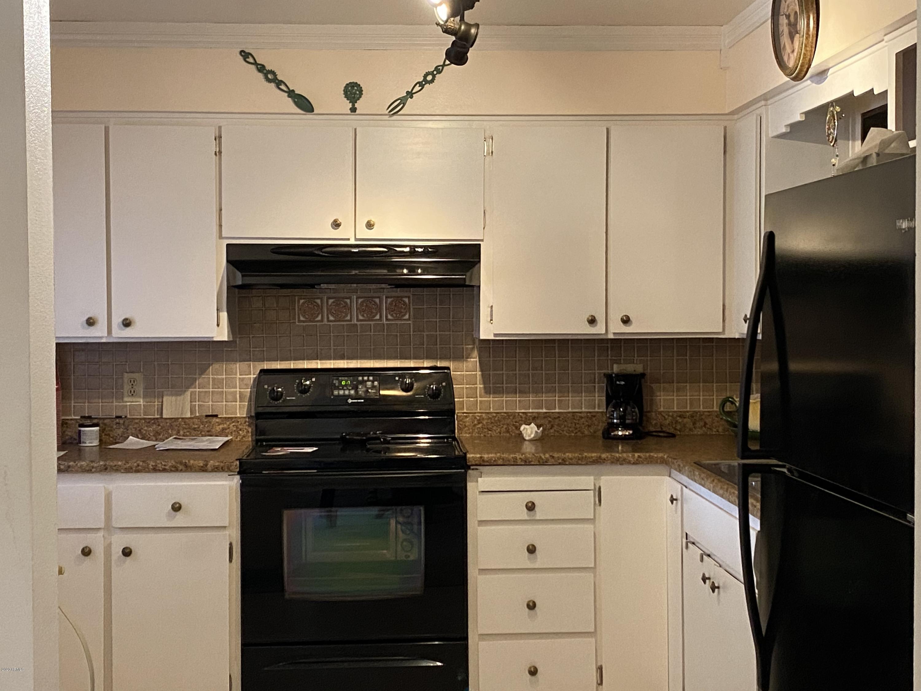604 North Recker Road Mesa, AZ 85205 - Photo 5 of 43 Lots of cabinets