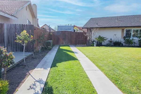 a view of a backyard with a garden