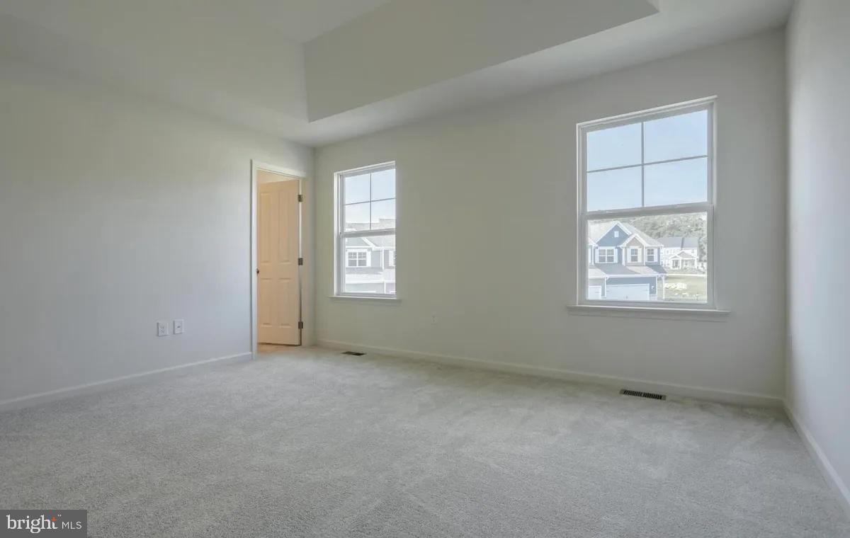 4118 Orrs Bridge Road, Unit 27 Mechanicsburg, PA 17050 - Photo 14 of 18 an empty room with windows