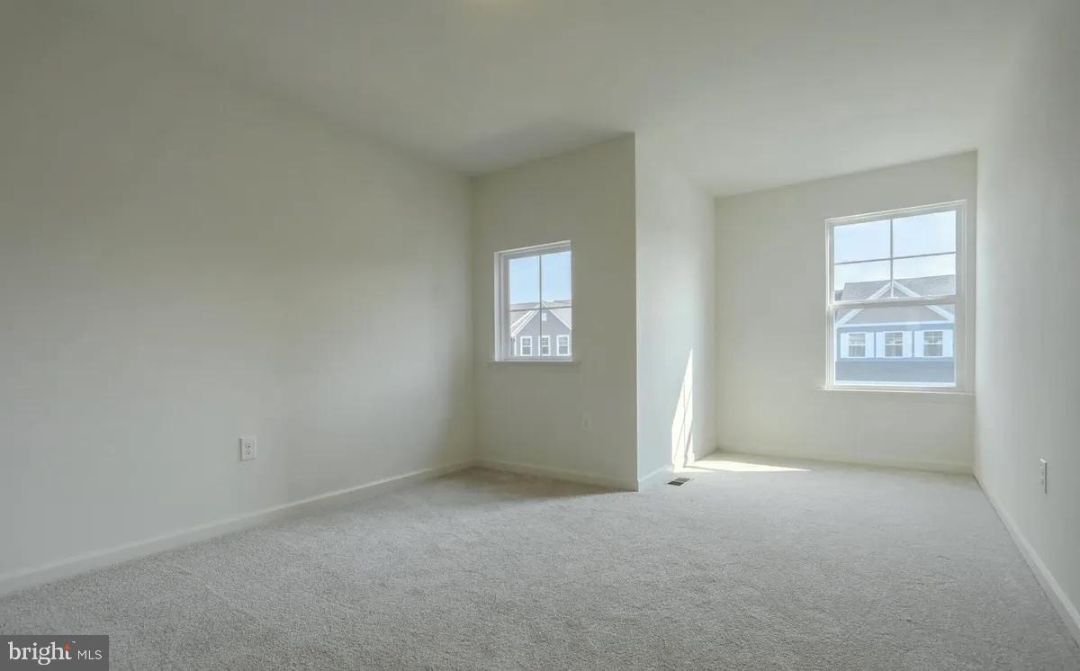 4118 Orrs Bridge Road, Unit 27 Mechanicsburg, PA 17050 - Photo 17 of 18 an empty room with windows