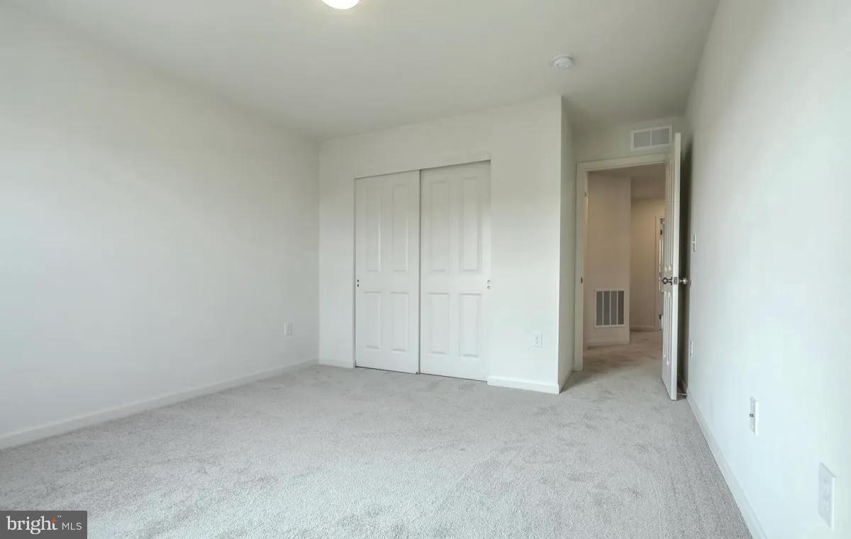 4118 Orrs Bridge Road, Unit 27 Mechanicsburg, PA 17050 - Photo 6 of 18 an empty room with closet area