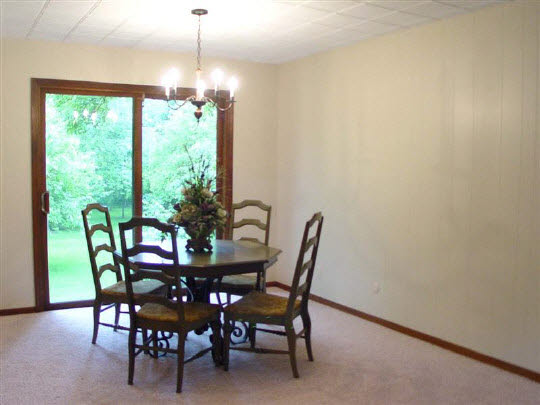 3005 Spring Creek Road Rockford, IL 61107 - Photo 3 of 6 a dining room with furniture and window