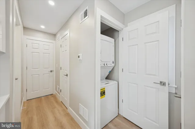 a view of a livingroom with wooden floor