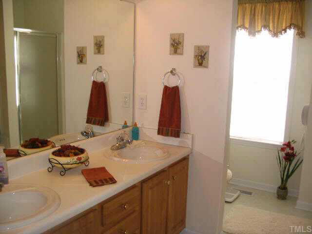 1017 Linden Crest Road Raleigh, NC 27603 - Photo 8 of 10 Master bath - double vanity, whirlpool tub Other