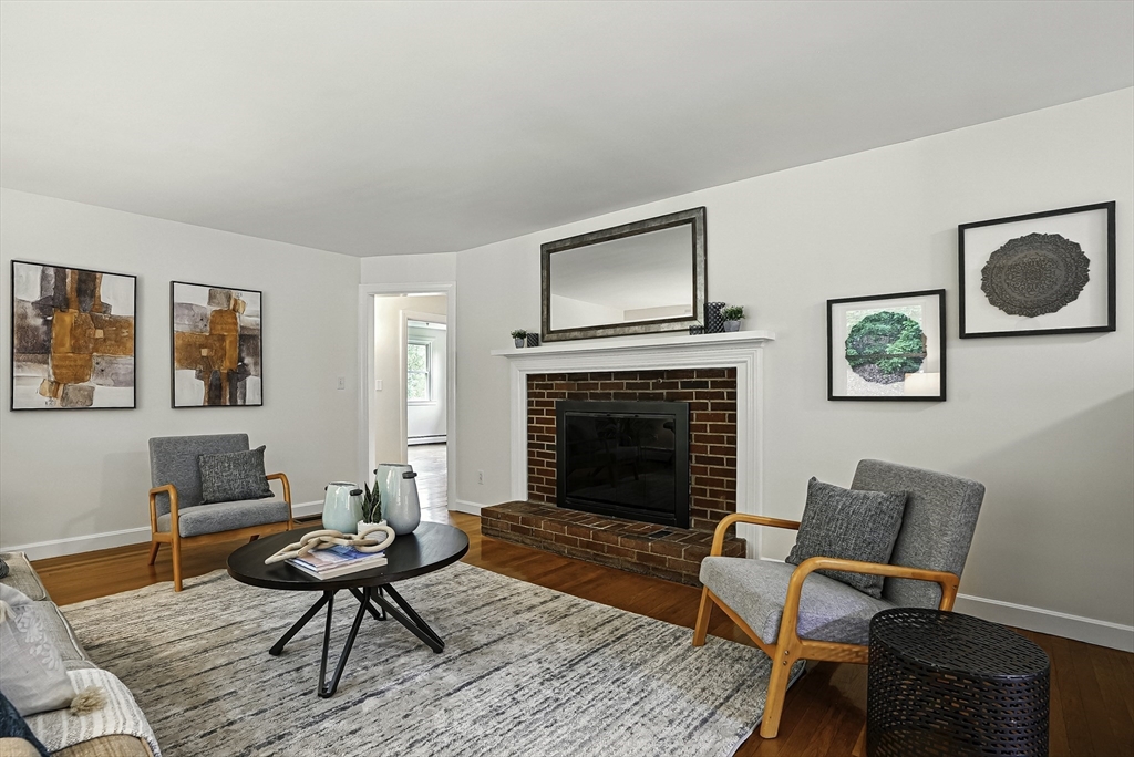 110 Bethany Road Framingham, MA 01702 - Photo 13 of 42 a living room with furniture and a fireplace