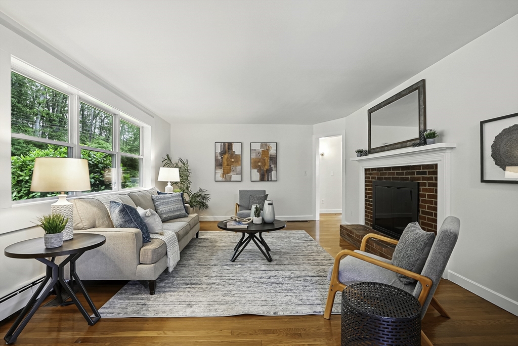 110 Bethany Road Framingham, MA 01702 - Photo 14 of 42 a living room with furniture and a fireplace