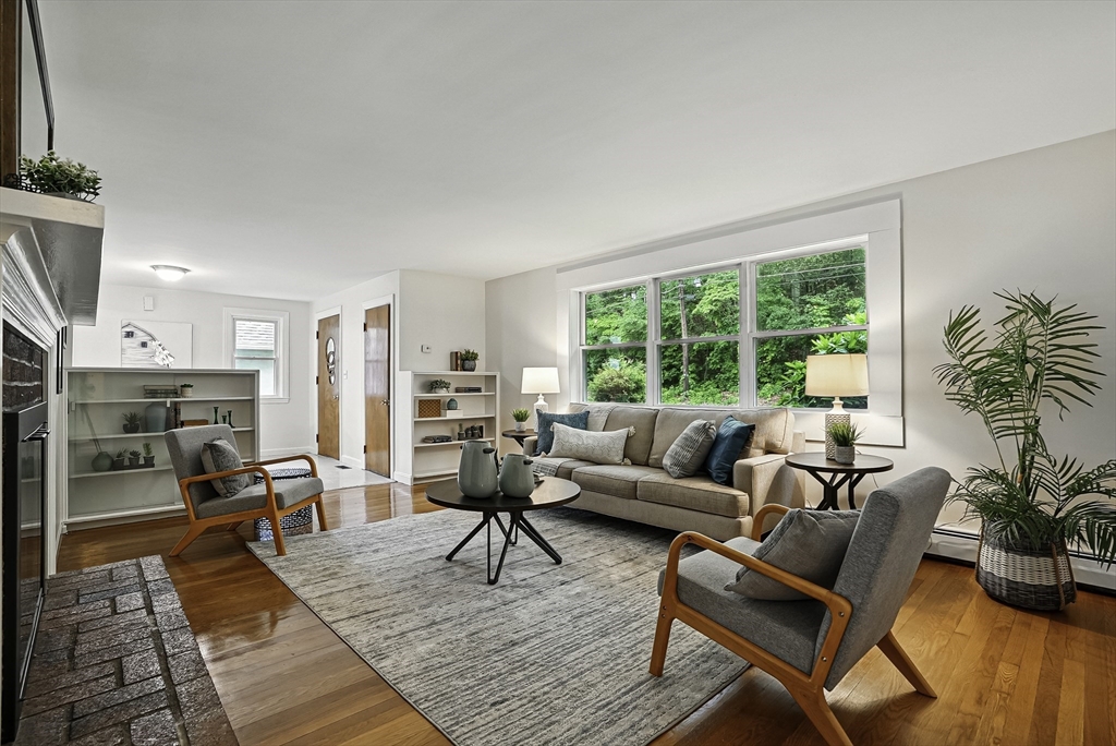 110 Bethany Road Framingham, MA 01702 - Photo 16 of 42 a living room with furniture and a large window