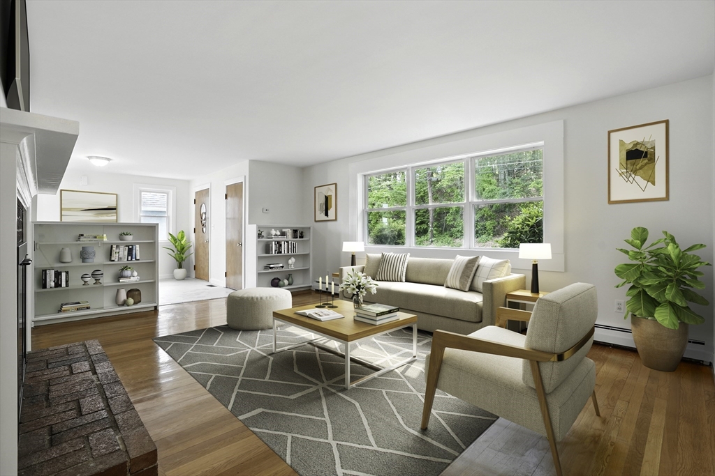 110 Bethany Road Framingham, MA 01702 - Photo 17 of 42 a living room with furniture and a large window