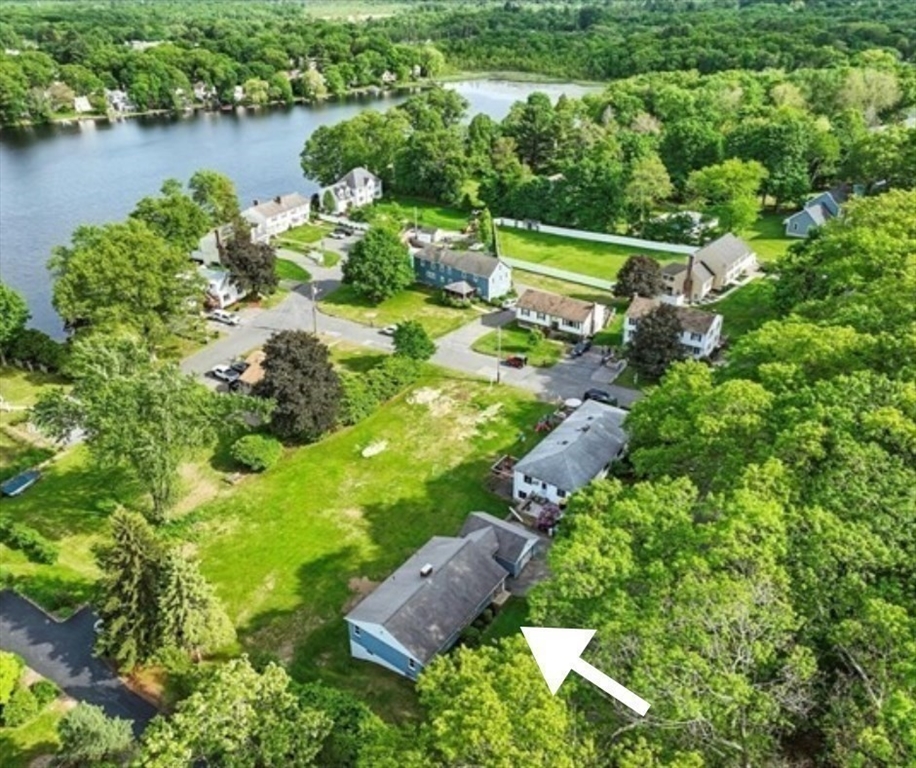 110 Bethany Road Framingham, MA 01702 - Photo 42 of 42 an aerial view of lake with residential house with outdoor space and trees all around