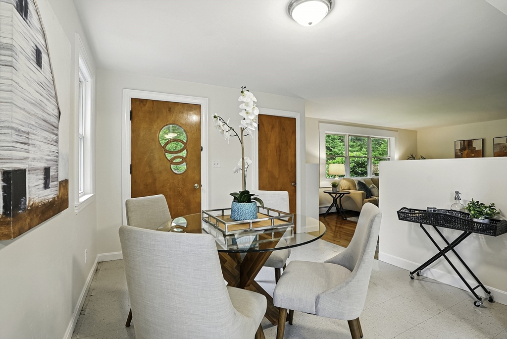 110 Bethany Road Framingham, MA 01702 - Photo 9 of 42 a living room with furniture and a window