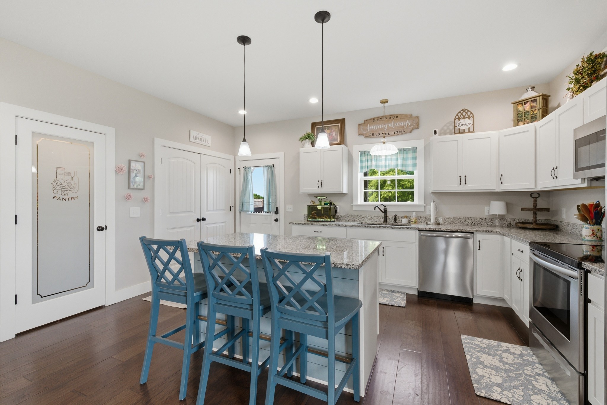 184 Lebanon Highway Carthage, TN 37030 - Photo 14 of 36 a kitchen with stainless steel appliances granite countertop a kitchen island a stove a table and chairs in it