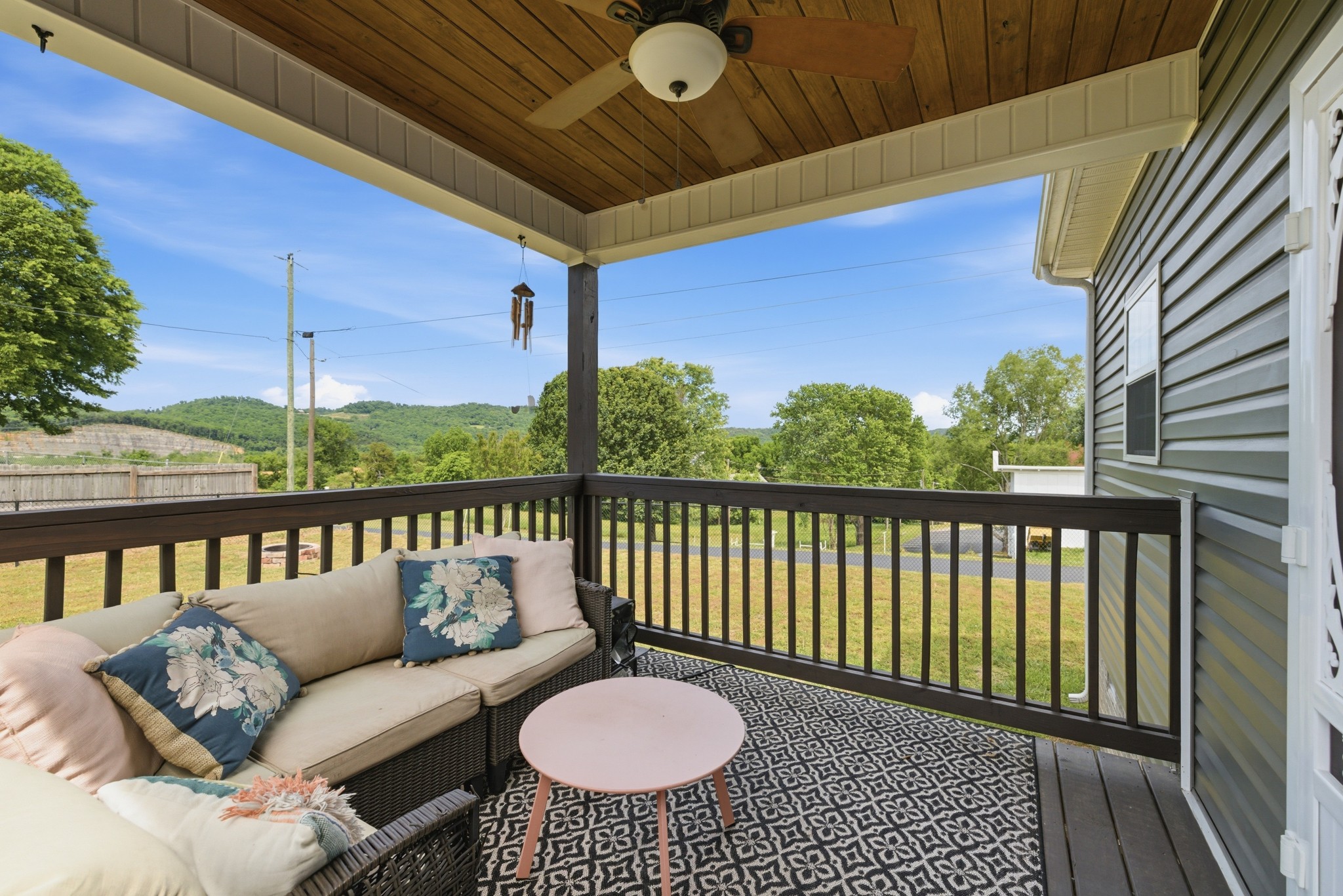 184 Lebanon Highway Carthage, TN 37030 - Photo 26 of 36 a balcony with wooden floor table and chairs