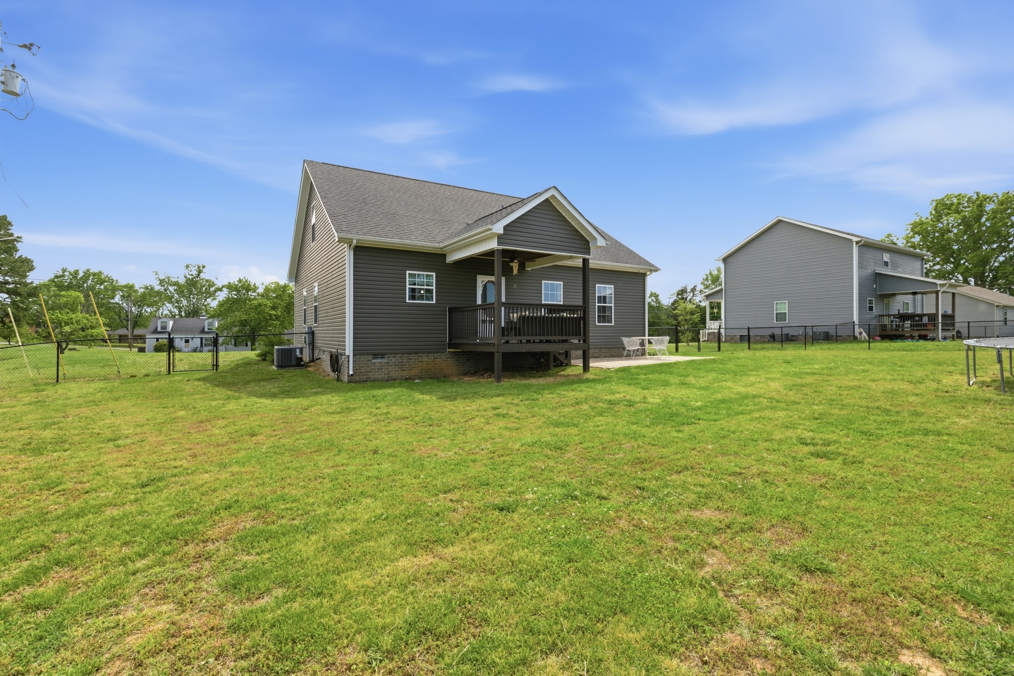 184 Lebanon Highway Carthage, TN 37030 - Photo 28 of 36 a house with huge green field in front of it