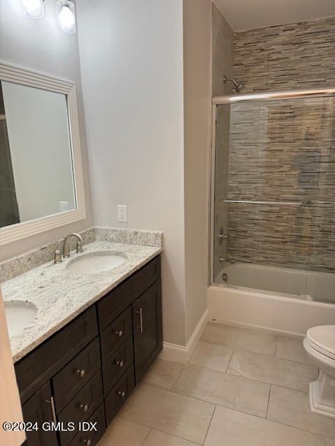 125 Hamilton Avenue, Unit 2 Greenwich, CT 06830 - Photo 14 of 20 a bathroom with a granite countertop sink toilet and shower