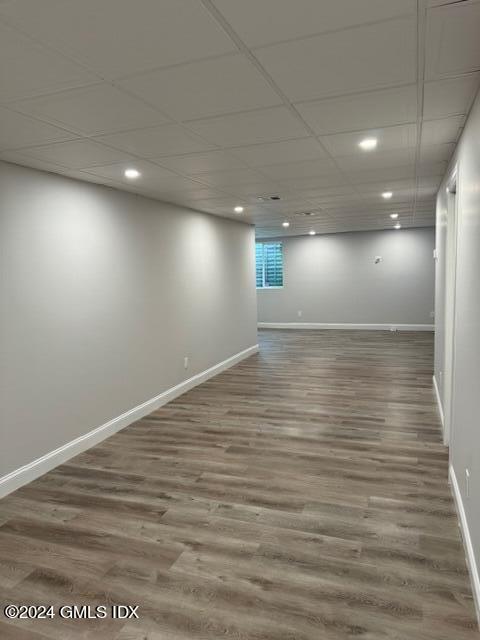 125 Hamilton Avenue, Unit 2 Greenwich, CT 06830 - Photo 15 of 20 an empty room with wooden floor and windows