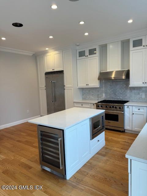 125 Hamilton Avenue, Unit 2 Greenwich, CT 06830 - Photo 3 of 20 a kitchen with stainless steel appliances granite countertop a stove a sink and a refrigerator