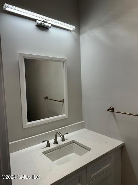 125 Hamilton Avenue, Unit 2 Greenwich, CT 06830 - Photo 5 of 20 a bathroom with a sink vanity and a mirror